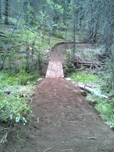 Trail with wooden bridge